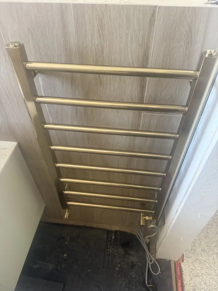 Brushed brass towel rail
